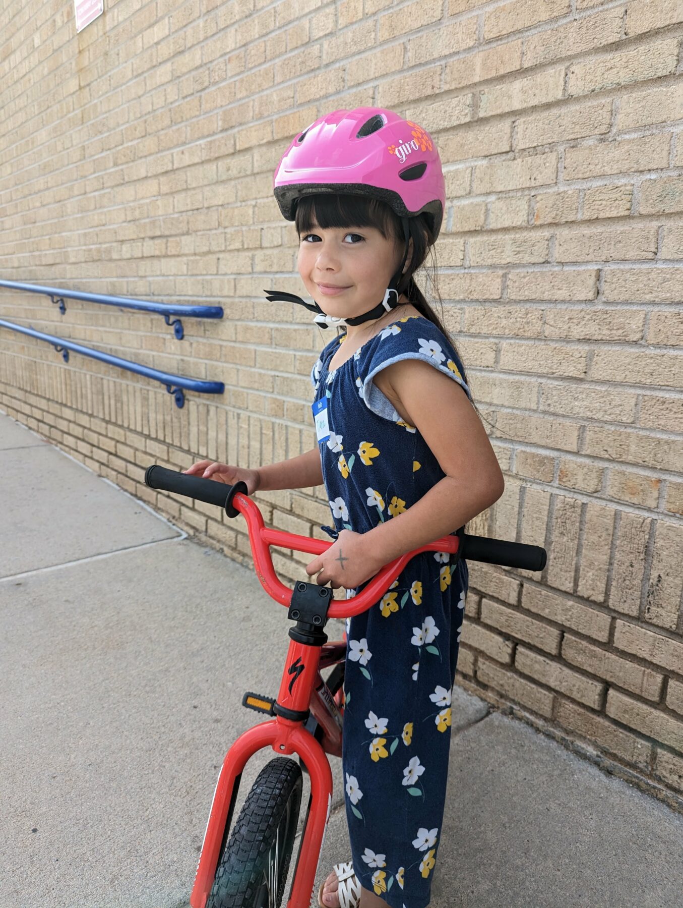 Girl smiling with bike
